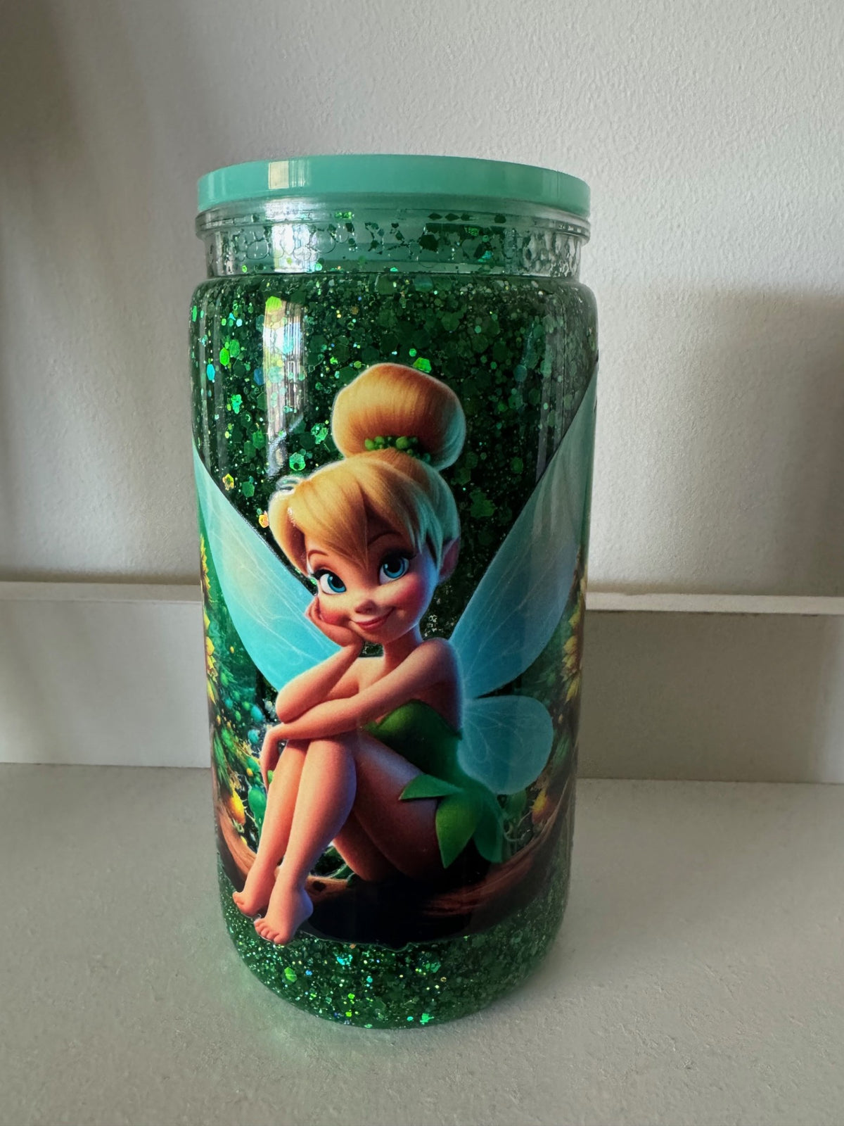 16oz Snowglobe Tumbler with Tinker Bell design on a white surface.
Homemade - BH Creations By Mel