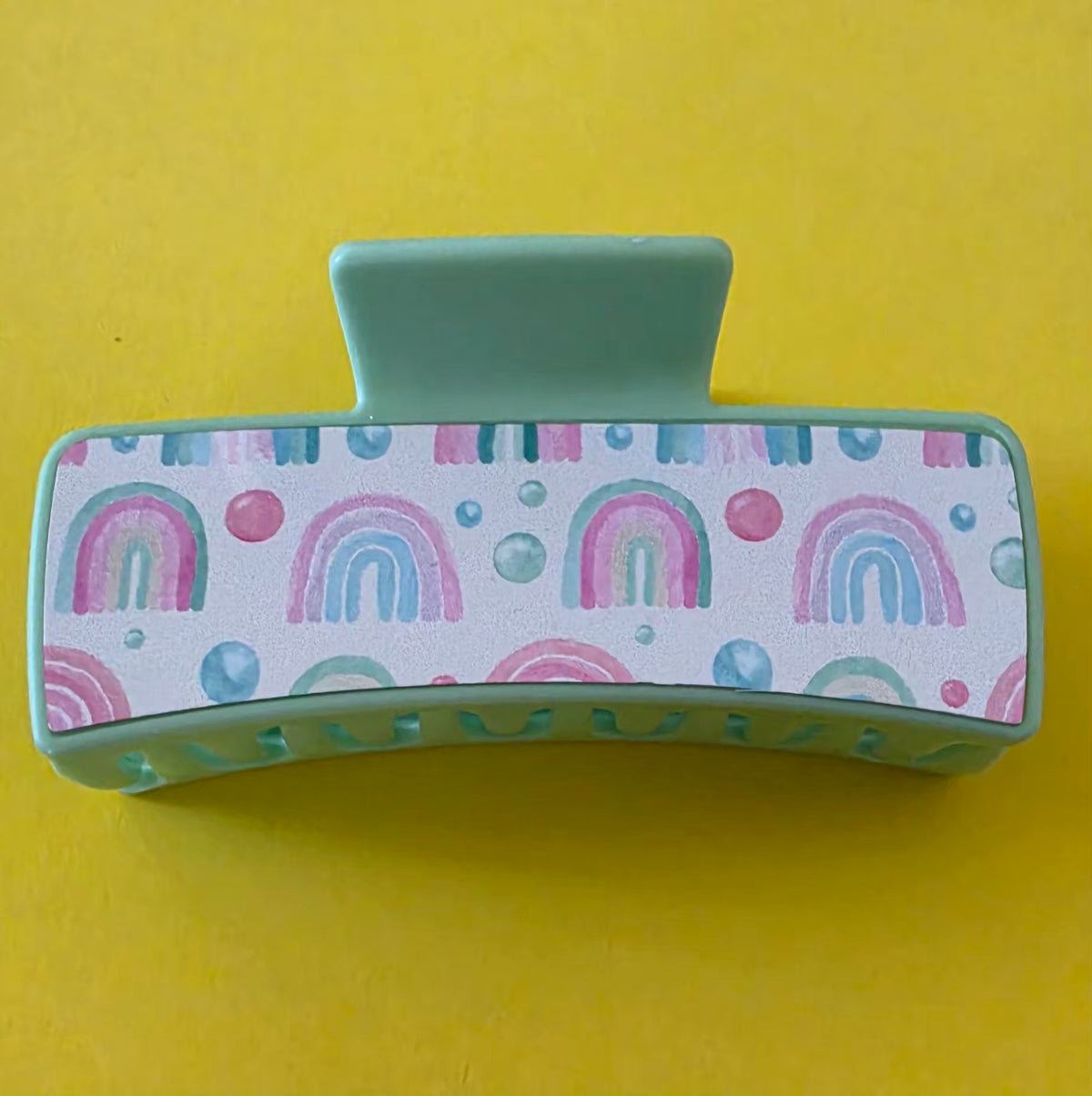 Large Claw Clip with rainbow pattern on a yellow background.
Homemade - BH Creations By Mel