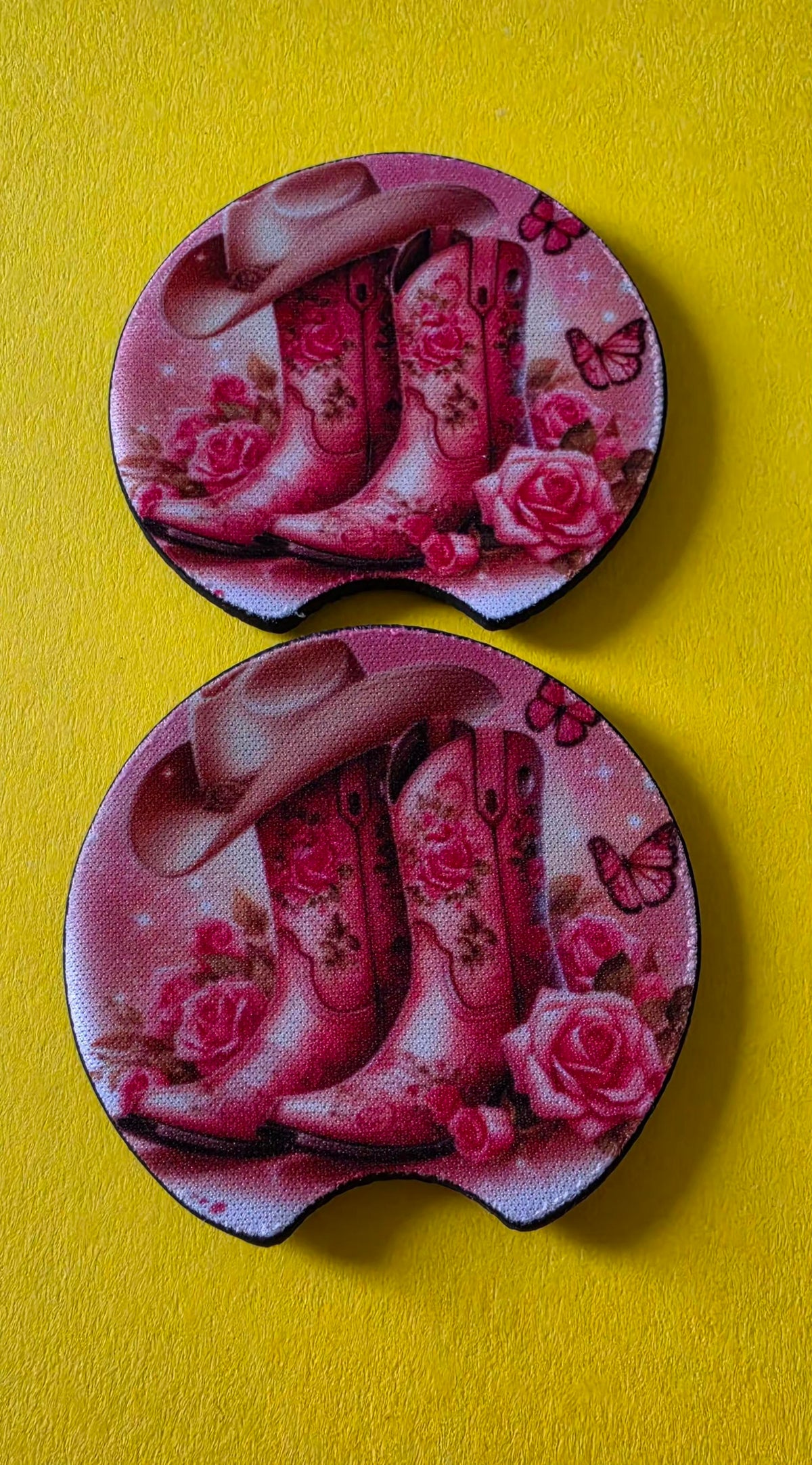 Two pink coasters with cowboy boots and flowers on a pink background.
Homemade - BH Creations By Mel